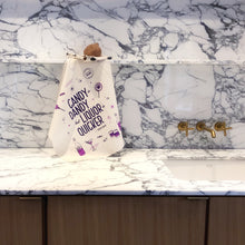 Candy is Dandy Tea Towel in Kitchen
